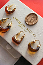 Infuse your style with the rich, warm hues of our best-selling earrings. Loved by customers for their radiant color and timeless appeal, these earrings add a touch of cozy sophistication to any look. Experience the allure of our top-selling amber-toned ea