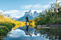 One man crossing a pond in Torres del Paine National Park, Chile
