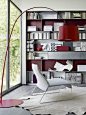 Good modern bookshelf (don't like the maroon though).  Oh, we have a twiggy lamp too (but standing and white, not curved)