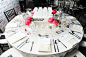 <p> Peonies in pink tones added a pop of color to the tables’ black-and-white decor.</p>