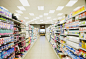 Defocussed view of grocery store aisle by Caia Images on 500px