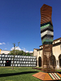 the italian architect installed a wall of modular steel elements which projected images taken from the museum's archival collection.