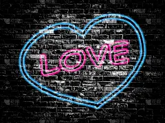 爱的标志在古老的黑色复古砖墙背景上