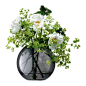 Buy LSA International Polka Vase Sheer Zinc - 11cm | Amara : Display small sprigs to large headed floral bouquets in style with LSA International’s Polka vase range in zinc. Available in two sizes, this zinc grey hand-painted vase has been mouth-blown by