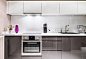 armoires-cuisine blanches grises brillantes push-open plan travail corian