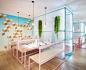 Pink and blue pipes with white fencing at PNY's new Restaurant designed by CUT Architectures | KNSTRCT