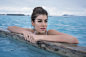 Girl relaxing in geothermal pool outdoors by Andrey Bezuglov on 500px