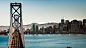 cityscapes cars hills ships bridges buildings skyscrapers sea 