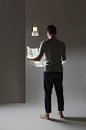 fabien roy's rocket nozzle-shaped lamp hovers right above you :  