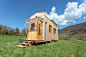 optinid tiny house features a sliding roof that opens to the sky designboom