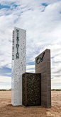 Three vertical volumes create high branding impact. The retainer less illuminated acrylic lettering glows on the 20' tower.: 