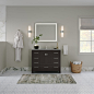 Bathroom - transitional mosaic tile floor, white floor and single-sink bathroom idea with shaker cabinets, black cabinets, beige walls, an undermount sink, marble countertops, white countertops and a freestanding vanity