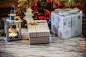 Two Gray and Beige Gift Boxes Beside Gray Metal Lantern