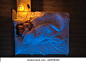 The couple sleeping on the bed. Evening night time. View from above