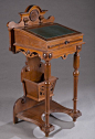 A Renaissance Revival walnut utility desk. Late 19th century.