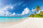 beautiful-beach-with-white-sand-blue-ocean-blue-sky