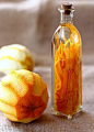 Lemon/Orange Extract

1-2 - whole organic lemons or 1 orange
3/4 cup - Vodka
glass bottle with lid/cork
Wash and dry fruit thoroughly before peeling off the thin outer layer. If any white pith remains, slice it off with a paring knife as they tend to add 