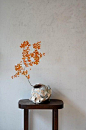 I love the stark contrasts of dark wood and golden leaves with the white. Gorgeous and earthy. Ikebana-by-Mario-Hirama