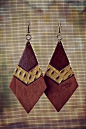 handmade leather earrings from thailand.