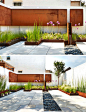 9 Ideas For Including Weathering Steel Planters In Your Garden // Short built-in weathered steel planters around the perimeter of this patio add color and texture to the space with the grassy plants keeping things soft and welcoming.