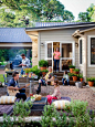 Outdoor Living - like the easy-care gravel patio, lined with stacked limestone to provide additional seating.: 