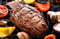 Beef steak on a barbecue grill with vegetables : Juice Beef steak on a barbecue grill with vegetables