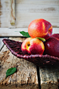 nectarine in a wicker plate. by Jevgeni Proshin on 500px