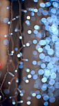 Xmas bokeh : These are cascades of little Xmas decoration lights in a supermarket. 