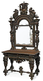 A Continental Renaissance Revival carved walnut console and mirror late 19th century: 