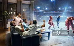 Students watching very realistic Ice hockey game at home