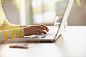 High-Res Stock Photography: Woman typing on her laptop