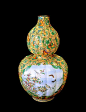 廣彩開光花鳥紋葫蘆瓶 清 乾隆（1736 - 1795） 高：56.5厘米 腹徑：33厘米 「廣彩」屬銅胎畫琺瑯器。琺瑯彩料是在明代由歐洲傳入中國，主要施於瓷胎、玻璃胎和金屬胎上。有帶金屬絲盤結花紋的「掐絲琺瑯器」(即「景泰藍」)與及把琺瑯釉料填入經敲、刻或鑄成的凹陷花紋內的「內填琺瑯器」。 此瓶為銅胎，葫蘆形。瓶身呈瓜棱狀。通體施琺瑯彩，在滿佈斑點的黃釉地上繪葫蘆蔓籐，代表瓜瓞連綿，寓意多子多孫；並配以白梅、綠葉、蝴蝶及草蜢等裝飾。瓶腹兩面有開光，內施天藍地繪以花卉、小鳥及蝴蝶。此瓶體積大、顏色鮮艷，描