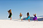 Girls walking on desert sand dunes by Gable Denims on 500px