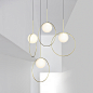 Bola Halo - Alchemy Collections : Taking its inspiration from pendant jewelry, Bola Halo is a uniquely expressive pendant light featuring a chromated ring that balances delicately over its elegant opal glass shade while allowing its surroundings to shine 