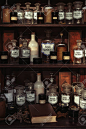 Wooden Shelves With Old Bottles In An Old Retro Apothecary Shop Stock  Photo, Picture And Royalty Free Image. Image 115695665.