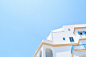 A white Mediterranean-style building under a blue sky