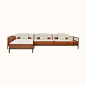 Sofa Sellier 2-seater with chaise lounge : Hermes 2-seater sofa in Canaletto walnut with cane work on the left side and chaise lounge. Upholstered in leather andfabric in fawn and cinnamon, fabric bag on the right armrest. Comes with three large pillows a