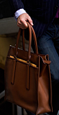 Handsomely burnished leather and beveled strap anchors give the modern Legacy Leather Tote a timeless Coach look.: 