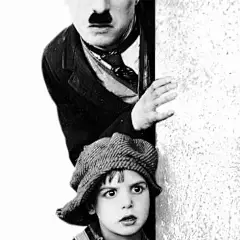 Charlie Chaplin (April 16, 1889 - December 25, 1977) and Jackie Coogan (October 26, 1914 - March 1, 1984) in &quot;The Kid&quot;, 1921. #still: