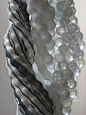 ROWAN MERSH, GLASS WORKS 2007: glass encased in fabric. spiral sculptures.