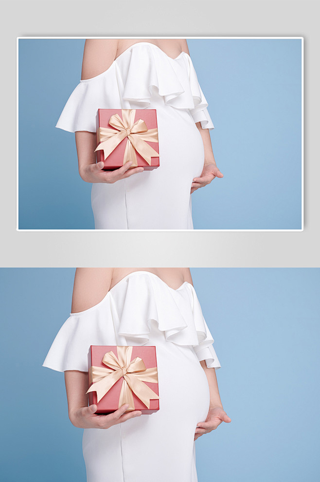 手拿礼物礼品盒手抚肚子孕妇人物摄影图-众...