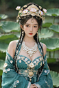  Detailed high, high precision, high quality, the UHD, 16 k, rich details, abundant element, shows that a girl, beautiful, lotus, lotus leaf, (big breasts:1.89), pearlygates, traditional clothing, clothing patterns, miao clothing headwear, Face Score, MAJ