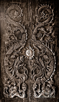 antique-wooden-door-sculpt-a-dragon-god-the-age-of-approximately-200-years-in-the-ancient-city-noppharat-manakul