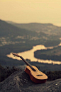 Learn to play guitar, and travel the world and play FOR PEOPLE.: 