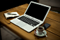 工作，办公-Laptop, mobile phone, notebook and coffee cup on wooden table