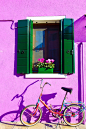 Burano Italy is a great day trip from Venice and features brightly coloured buildings perfect for photographers. No two buildings are the same colour on Burano.