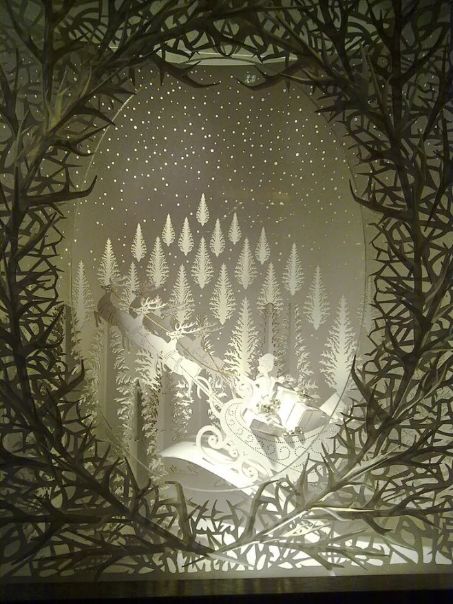 Stunning laser-cut paper window display-花瓣网