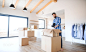 Mature man with boxes moving in new unfurnished house, unpacking.