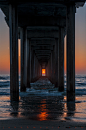 (Scripps Pier, La Jolla, California) The sun only lines up like this twice per year - Imgur