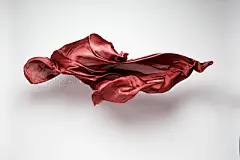abstract flying fabricabstract piece of red fabric flying, art object, design element